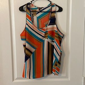 Super cute tank top. Love the little pocket and silky fabric